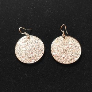Faux diamond earrings. Large round, pierced ears